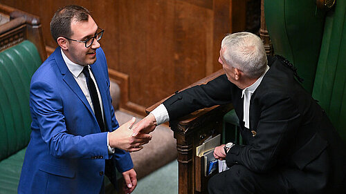 Tom Gordon shaking hands with the Speaker of the House of Commons in the House of Commons Chamber