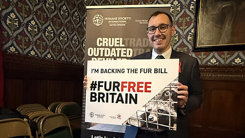 Tom Gordon with a sign reading '#furfree Britain