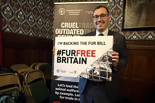 Tom Gordon with a sign reading '#furfree Britain