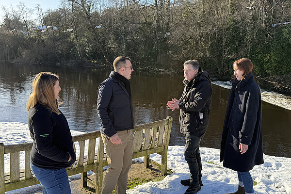 Tom Gordon, Councillor Hannah Gostlow and the Environment Agency in front of the River Nidd 