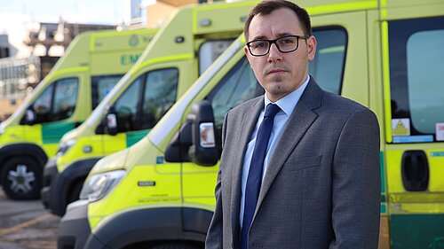 Tom Gordon stood by ambulances outside a hospital