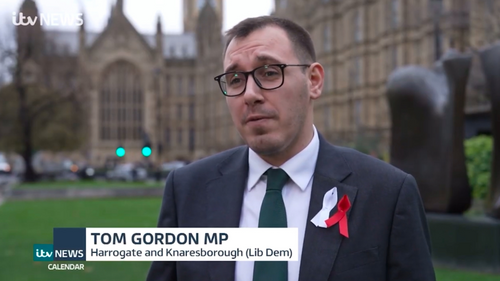 Tom Gordon when he appeared on ITV Calendar news, stood outside the Houses of Parliament