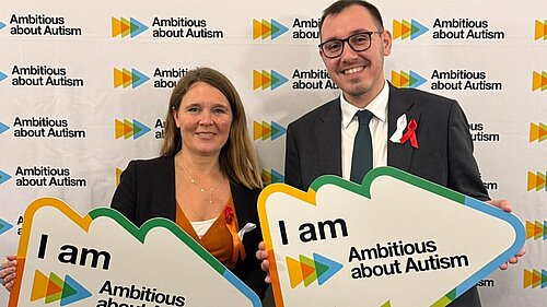 Tom Gordon MP with Vikki Slade MP with signs reading "I am Ambitious about Autism