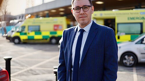 Tom outside Harrogate Hospital