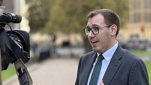 Tom Gordon on College Green outside Parliament