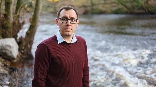 Tom stood by the River Nidd